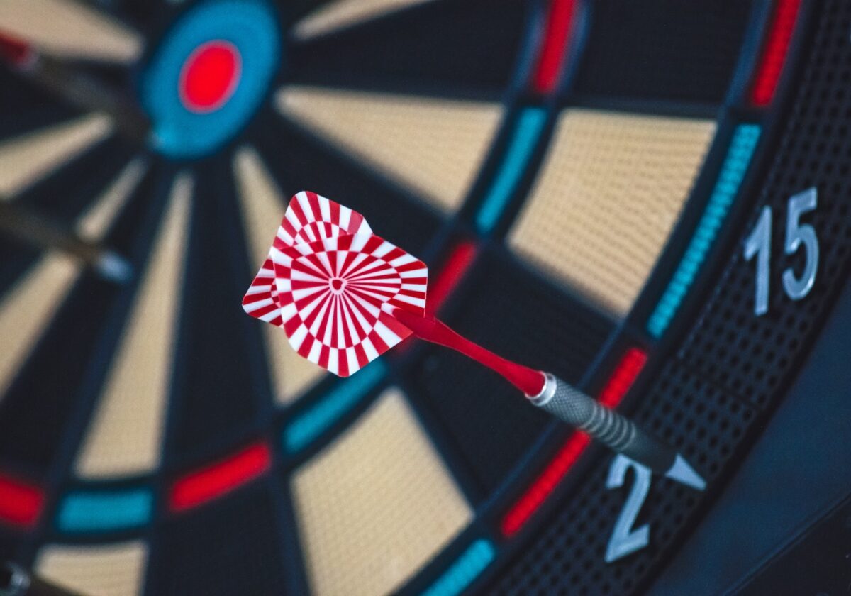 Red and White Dart on Darts Board